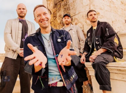 chris martin falls through trap door during coldplay concert in australia leaves fans worried