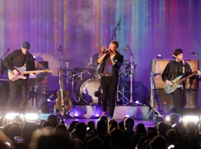 coldplay headline glastonbury for record breaking fifth time