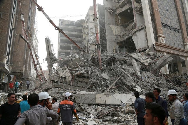 rescue crews work at the site of a ten storey building collapse in abadan iran may 23 2022 photo reuters rescue crews work at the site of a ten storey building collapse in abadan iran may 23 2022 photo reuters