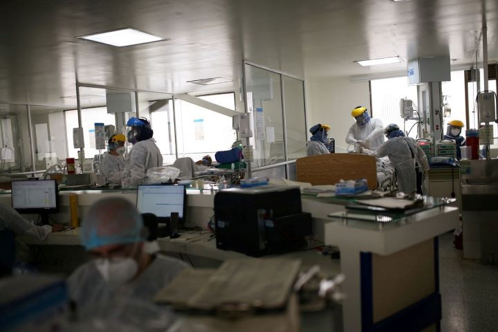 doctors and nurses are seen inside the intensive care unit icu of the el tunal hospital where they treat patients suffering from the coronavirus disease covid 19 in bogota colombia june 12 2020 picture taken june 12 2020 reuters luisa gonzalez