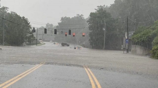 catastrophic us flooding leaves one dead another missing