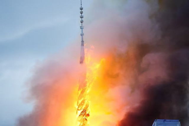 a view of the old stock exchange s twisted dragons on spire during a fire at the boersen in copenhagen denmark april 16 2024 photo reuters