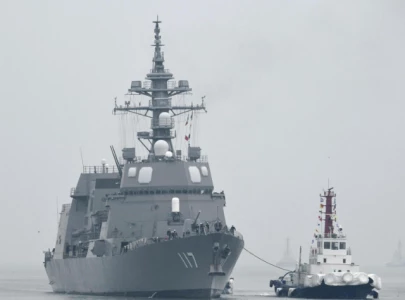 japan fires naval captain for entering chinese waters during military drills