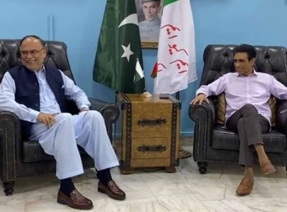 ahsan iqbal vows mqm p s concerns over constitutional amendments will be addressed