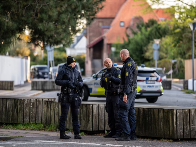 Police officers talk during the investigation of two blasts near the Israeli embassy in Copenhagen, Denmark, October 2, 2024. Emil Nicolai Helms/Ritzau Scanpix/via REUTERS