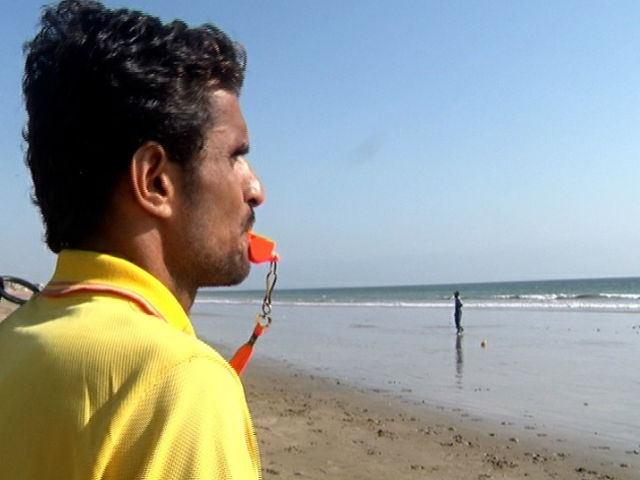 Bay Watch: Lifeguards perform their duties on a beach in Karachi. Photo: Express