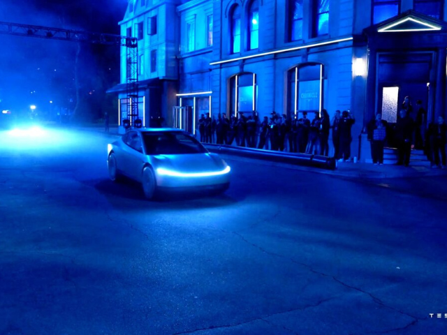tesla s elon musk debuts futuristic robotaxi and robovan