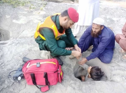 watch 12 year old boy stuck in rock while herding goats gets rescued in rawalpindi watch 12 year old boy stuck in rock while herding goats gets rescued in rawalpindi