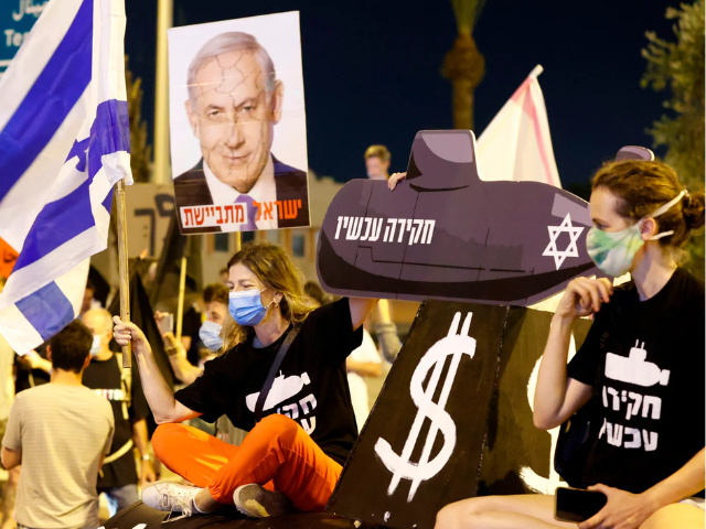 israeli protesters at an anti government demonstration outside the ben gurion airport near tel aviv on september 13 2020 demanding the resignation of prime minister benjamin netanyahu over several corruption indictments and his handling of the coronavirus crisis jack guez afp