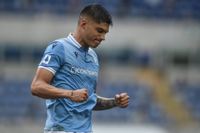 correa keeps lazio in champions league hunt with milan double
