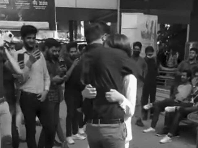 a screengrab from one of the viral videos from lahore university where a student proposed to her love interest causing a stir on twitter