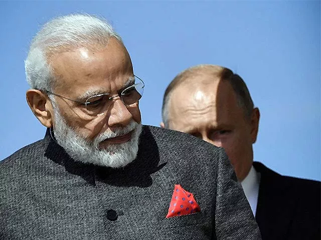 narendra modi and vladimir putin visit a shipyard photo afp narendra modi and vladimir putin visit a shipyard photo afp