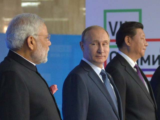narendra modi vladimir putin and xi jinping at the 7th brics summit photo afp narendra modi vladimir putin and xi jinping at the 7th brics summit photo afp