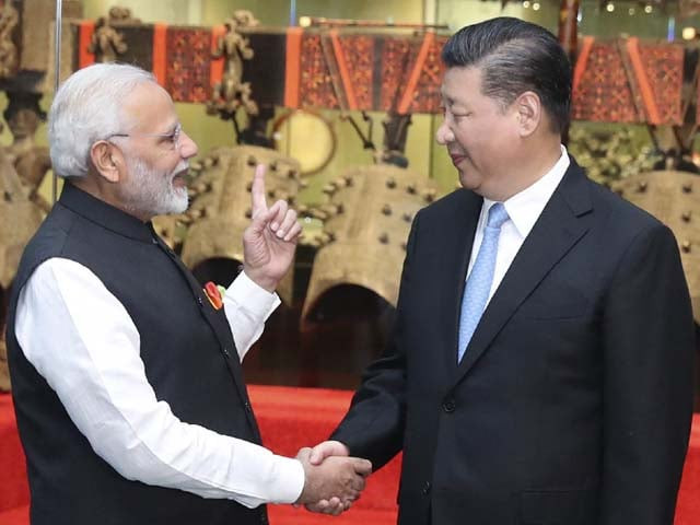xi jinping shakes hands with narendra modi photo afp