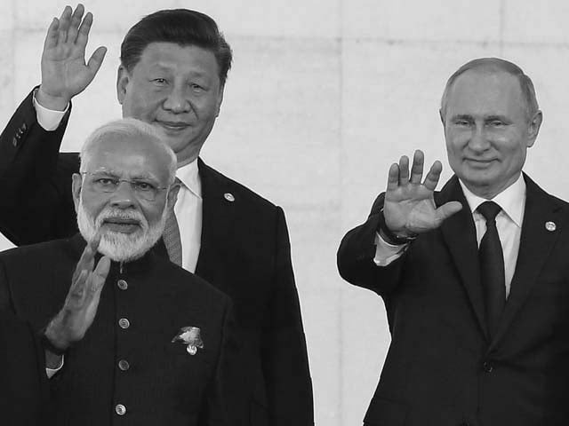 narendra modi xi jinping and vladimir putin wave to press photo afp narendra modi xi jinping and vladimir putin wave to press photo afp