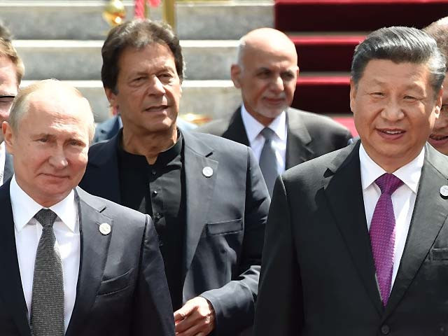 president vladimir putin prime minister imran khan and president xi jinping at the sco photo afp