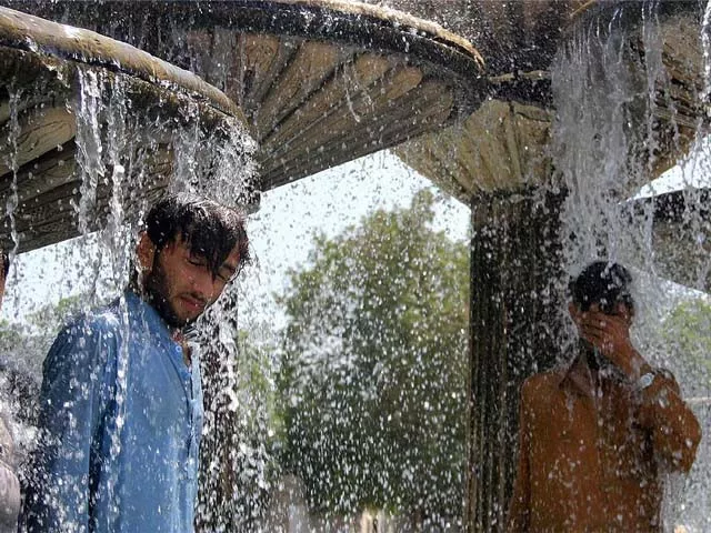 pakistani residents cool off during an hot summer day in karachi photo afp pakistani residents cool off during an hot summer day in karachi photo afp