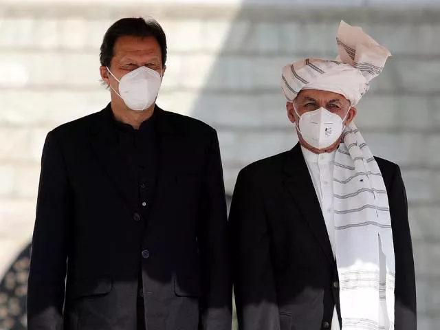 afghan president ashraf ghani welcomes the prime minister of pakistan imran khan photo afp afghan president ashraf ghani welcomes the prime minister of pakistan imran khan photo afp