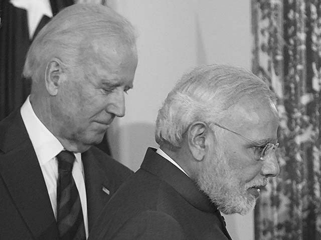 narendra modi walks alongside joe biden photo afp