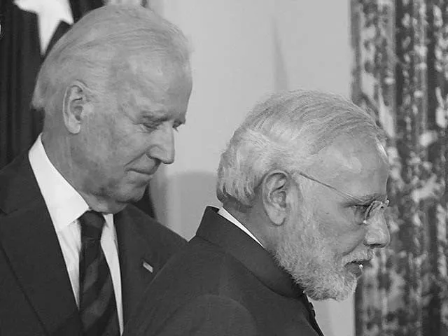narendra modi walks alongside joe biden photo afp narendra modi walks alongside joe biden photo afp