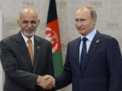 the president of russia vladimir putin meets with the afghanistan president ashraf ghani photo afp