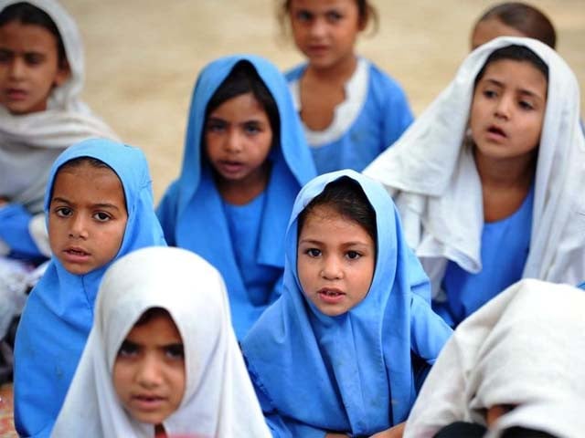 pakistani girls attend class at a school in mingora photo afp