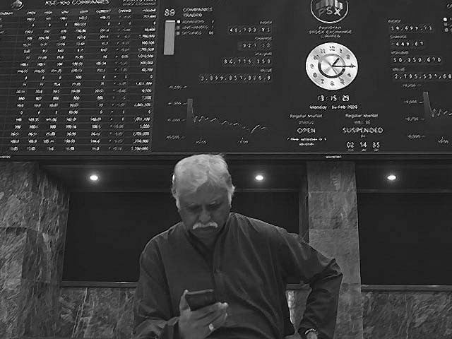 a stockbroker during a trading session at the pakistan stock exchange in karachi photo afp a stockbroker during a trading session at the pakistan stock exchange in karachi photo afp