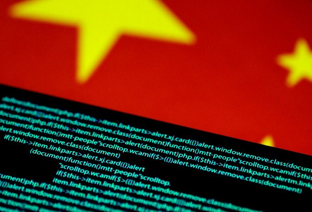 computer code is seen on a screen above a chinese flag in this july 12 2017 illustration photo photo reuters