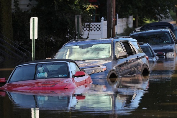 Flooded cars are pictured after the remnants of Tropical Storm Ida brought drenching rain, flash floods and tornadoes to parts of the northeast in Mamaroneck, New York, U.S., September 2, 2021. PHOTO: REUTERS