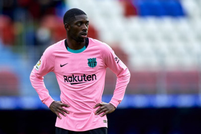 dembele offers sincere apologies over racism storm