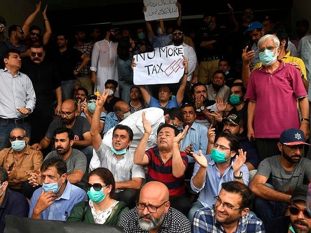 residents of dha chant slogan as they gather outside cbc office to protest against the failure to fix drainage problems on august 31 2020 photo afp residents of dha chant slogan as they gather outside cbc office to protest against the failure to fix drainage problems on august 31 2020 photo afp