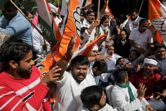 activists of the youth wing of india s main opposition congress party take part in a protest outside up bhawan after people were killed when violence broke out in india s uttar pradesh state on sunday when a car linked to a federal minister ran over farmers taking part in a protest against controversial farm laws in new delhi india october 4 2021 photo reuters activists of the youth wing of india s main opposition congress party take part in a protest outside up bhawan after people were killed when violence broke out in india s uttar pradesh state on sunday when a car linked to a federal minister ran over farmers taking part in a protest against controversial farm laws in new delhi india october 4 2021 photo reuters