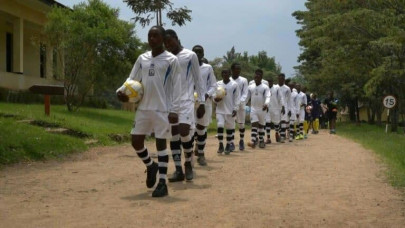 in troubled drc football draws in youth in troubled drc football draws in youth