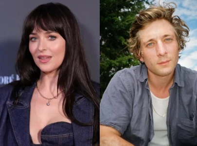 dakota johnson enjoys malibu beach day in yellow bikini with best friend jeremy allen white