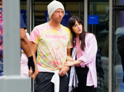 dakota johnson shows off massive emerald engagement ring shuts down chris martin breakup rumors dakota johnson shows off massive emerald engagement ring shuts down chris martin breakup rumors