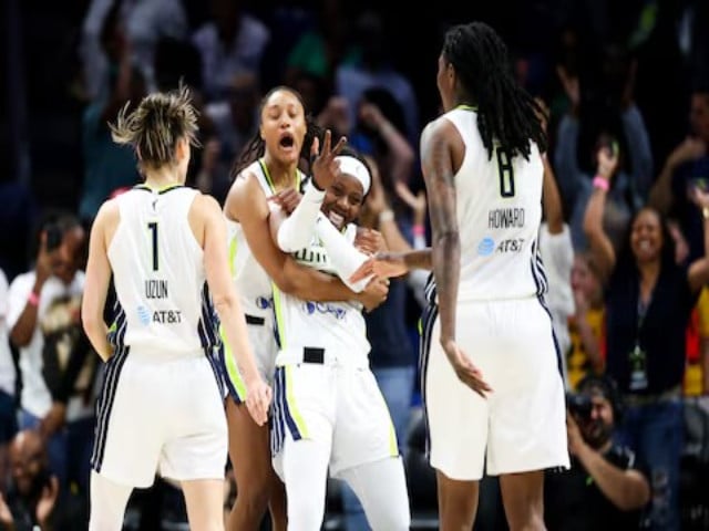 dallas wings guard arike ogunbowale 24 celebrates with teammates after scoring during the fourth quarter against the indiana fever at college park center on may 3 2024 file photo reuters