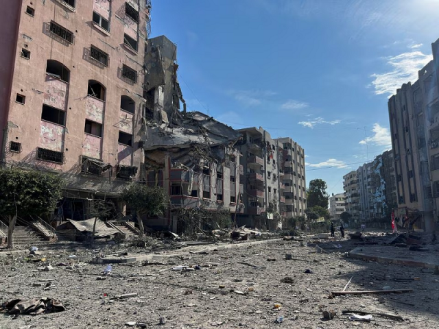 damaged residential buildings are seen in the aftermath of israeli strikes near al quds hospital in gaza city october 30 2023 photo reuters damaged residential buildings are seen in the aftermath of israeli strikes near al quds hospital in gaza city october 30 2023 photo reuters