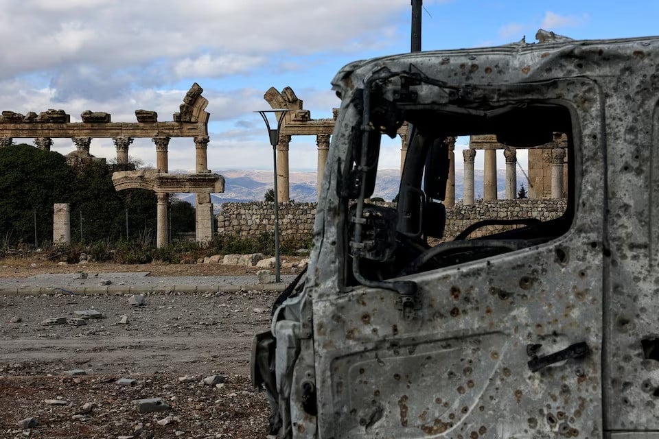 a damaged vehicle sits near the roman ruins on the second day of the ceasefire between israel and hezbollah in the eastern city of baalbek lebanon november 28 2024 photo reuters