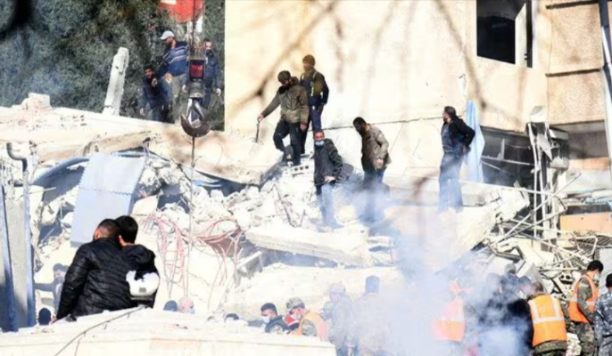 people inspect the damage at the site of an israeli strike in the mazzeh neighborhood of damascus syria photo reuters