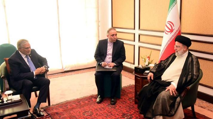 Foreign Minister Ishaq Dar meets Iranian President Ibrahim Raisi. PHOTO: Radio Pakistan