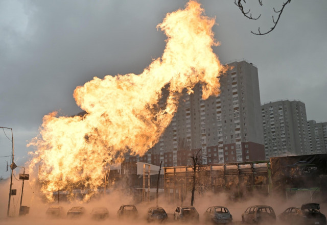 fire and burnt out cars are seen after a missile strike in kyiv photo afp fire and burnt out cars are seen after a missile strike in kyiv photo afp