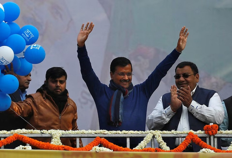 delhi chief minister and leader of aap arvind kejriwal waves to his supporters at the party headquarters in new delhi india february 11 2020 photo reuters