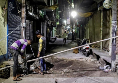 delhi police file rioting charges against government critics