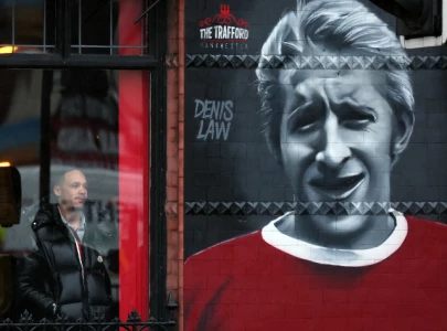 denis law a manchester united and scotland legend dies at 84