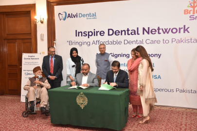 president alvi underfire over appearance at mou signing of son s firm president alvi underfire over appearance at mou signing of son s firm