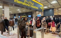 intl departures from pakistan tumble by half