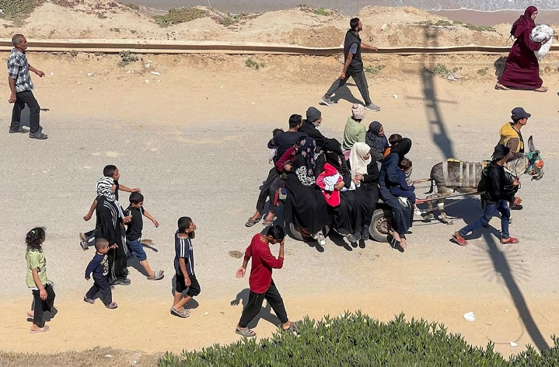 palestinians who were displaced by israel s military offensive on south gaza as seen from central gaza strip april 14 2024 photo reuters