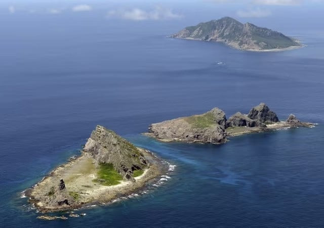 a group of disputed islands known as senkaku in japan and diaoyu in china is seen in the east china sea photo reuters a group of disputed islands known as senkaku in japan and diaoyu in china is seen in the east china sea photo reuters
