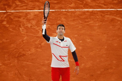 djokovic says win over carreno busta was pain in the neck