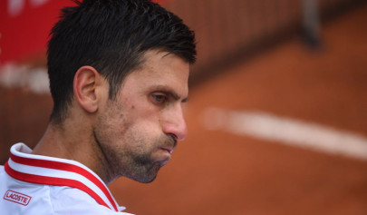 djokovic fumes at umpire in rain affected rome opener djokovic fumes at umpire in rain affected rome opener